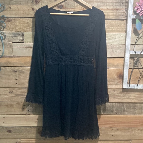 En Creme Dresses & Skirts - En Creme Bohemian Black Mini Dress. C